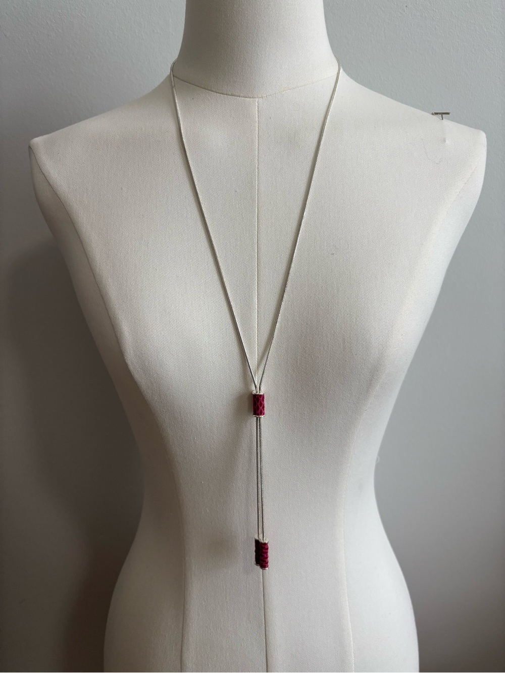 Nine West Silver Lariat Necklace with Pink Accents. 38in
